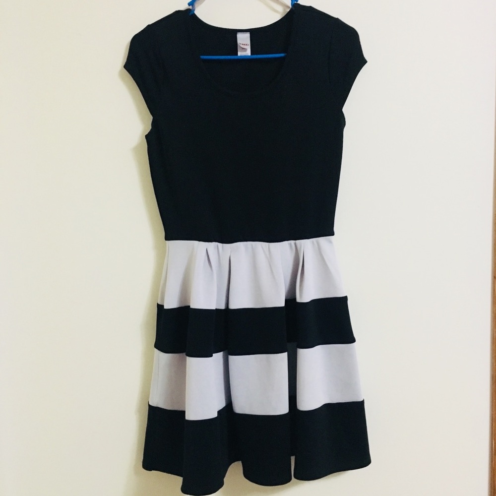 Dress with fun black and white stripped skirt